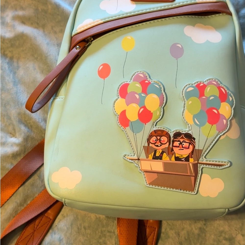 Loungefly Bags Disney Pixar “Up, Aventure Is Out There! Backpack